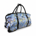 Black 20-inch rolling duffel bag with telescopic handle